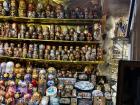 A stand in the market sells Russian dolls and other toys
