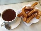 It is common to eat churros by dipping them in chocolate