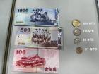 I wrote how much each Taiwanese coin is worth next to the coins...notice that the more money the bill is worth, the longer the bill!