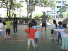 Doing warm-up exercises in P.E. class!