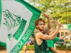 Holding the Cary High flag during the homecoming parade