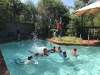 The boys and their friends enjoying an afternoon in the pool