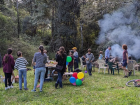 The boys often celebrate their birthdays with friends in the fields around the ecovillage, playing games and having a bonfire