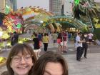 My sister and I exploring the decorations put out for Tet (the Vietnamese Lunar New Year) to celebrate the year of the dragon