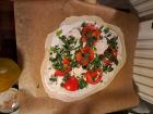 This is what raw flammkuchen looks like before it goes in the oven -- can you see the thin crust and the cream cheese?