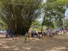 Kids playing on the playground at the Acampemos event