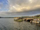 One of the docks on Lago Gatún where fishermen and tour companies operate from. It's the end of the dry season, and you can see the guayacán trees blooming in the background