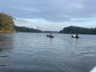 Fishermen in their cayucos on the Panama Canal