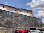 A mural depicting Cusco's history from founding, through colonization and independence, and to the present day