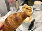 A typical Spanish breakfast, including a coffee and a pastry