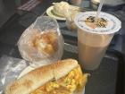 Typical Taiwanese breakfast (egg sandwich, sweet oil crullers, porridge, and milk tea)