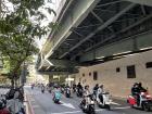 Typical view of busy street with many motorbikes passing by