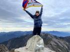 Holding the Tibetan flag at the peak of the tallest mountain in Taiwan!