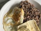 Gallo pinto with fried egg and cheese