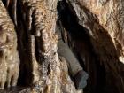 Exploring Cango Caves requires some tight squeezes, such as this one nicknamed the "Devils Chimney"