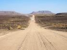 Gravel roads are common in remote and protected areas