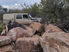 STS landcruiser driving through one of the rocky outcrops