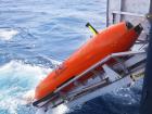 An AUV being deployed from the vessel