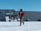 The South Pole Station makes a nice backdrop for this festively-clad Race Around the World participant