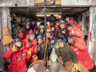One happy crew after the completion of a new hole (Yuya Makino, IceCube/NSF)