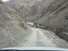 Traveling by jeep through a narrow Himalayan valley