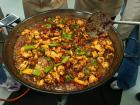 Cooking the meat for the paella