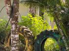 Tire art in front of a rural home