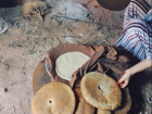 Cooking the bread that is used to eat tajine