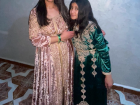 Emily with her sister Safa, wearing kaftans 