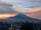 A beautiful sunset over Riobamba and Chimbrazo in the background