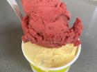 Raspberry (red) & Passionfruit Kiwi (yellow) gelato at Rapanui dessert shop