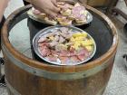 Assorted meat and cheese board at a salami factory