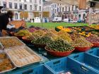 A farmer's market in Brussels, Belgium! Farmer's markets are often even cheaper and more fresh than what is available at a grocery store!