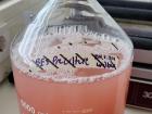 I grow Geobacter sulfurreducens (which have a reddish color) in a bottle before I add the bacteria to my reactor