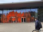 Orange paint thrown on a building at KIT to bring awareness to climate change