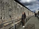 Photo of me next to a remaining portion of the Berlin Wall