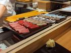 This is a spread of cut fish prepared for later use in order to make nigiri sushi!