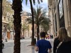 My mom and brother strolling through the mall area of the city, enjoying one of the sunny days 