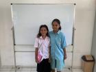 Febrizia (or Sakin to her friends) is in the white shirt, to the left of her friend. Both girls are wearing a version of the school uniform