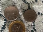 Some of the coins we use here in Timor Leste - a five and ten cent coin along with a one dollar coin