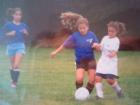 I started playing soccer when I was six years old! Here I am in blue at one of my soccer games through the years