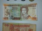 This is the common currency of Belize, the Belize dollar. Because Belize used to be a British colony, it still has Queen Elizabeth's image on all of its money!