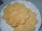 Belizean waffles, typically served for breakfast with butter and grated cheese or even chocolate sauce and cheese