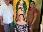 My host mom, her father and I pose in front of a portrait of La Virgen de Guadelupe, a gift given to him for Christmas