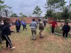 Peace Corps Volunteers and Paraguayan students jumping rope