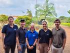 A group of volunteers visiting the agriculture high school