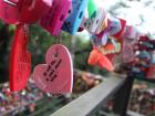 Many of the locks at personal messages written on them in both Korean and English.