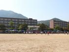 The high school is the building on the left, and the middle school is on the right