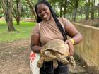 Rabria holding a turtle at the reptile farm