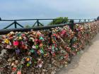This is called "El Parque del amor" or "Love Park" in English. You can buy a lock, write your name and the name of your loved one on it, lock it to a fence, and then throw the key in the ocean
